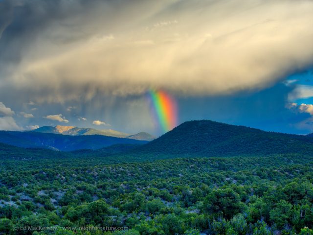 Rainbow fragment and rainbow light over Lake Peak, Sangre de Cristo Mountains, Santa Fe, New Mexico
