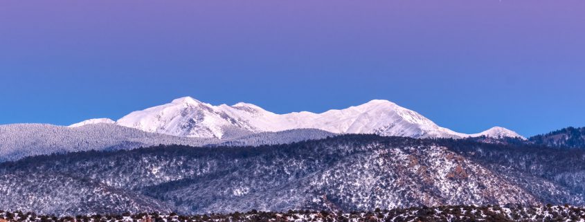 The Truchas Peaks with fresh snow and the Belt of Venus and Earh's shadow.